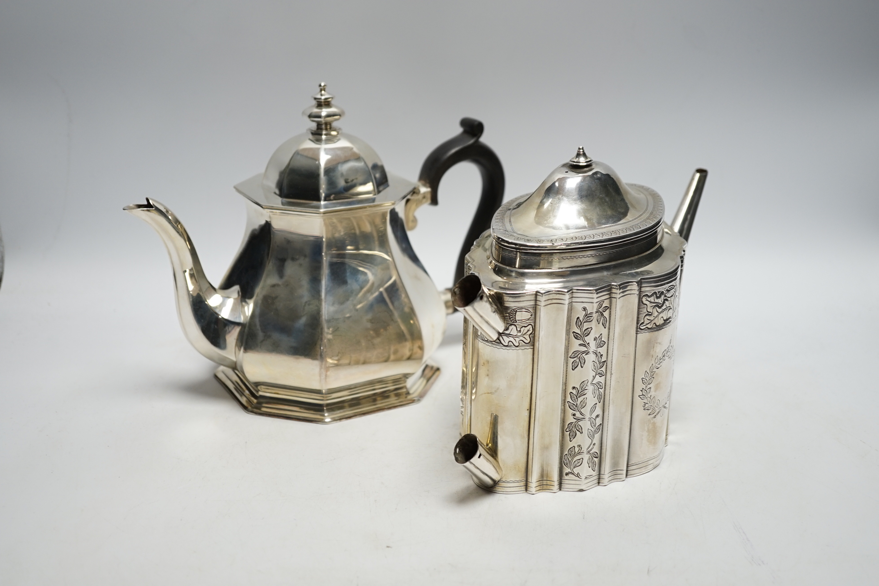 A George V silver octagonal teapot, Atkin Brothers, Sheffield, 1932, together with a George III silver teapot, Robert & David Hennell, London, 1795, (no handle or finial, gross weight 44.9oz.